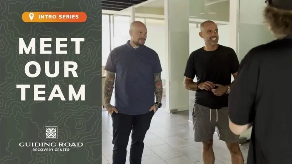 Meet Our Team video thumbnail showing Guiding Road Recovery Center staff talking in a hallway