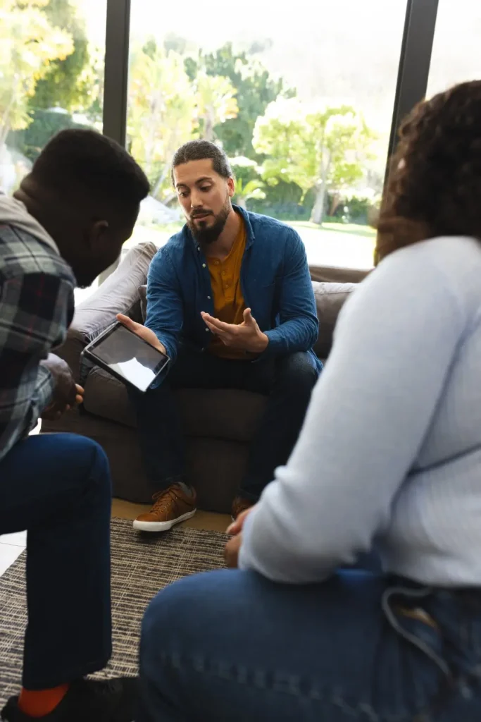 Man speaking during a group therapy session