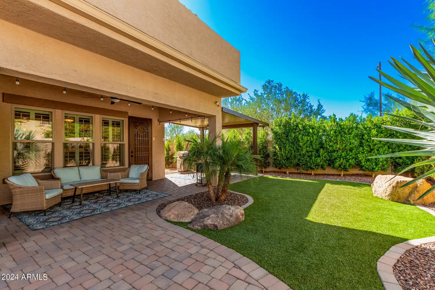 Backyard and covered patio at Guiding Road Phoenix